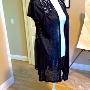 Cove up for wearing over an outfit or even a bathing suit.